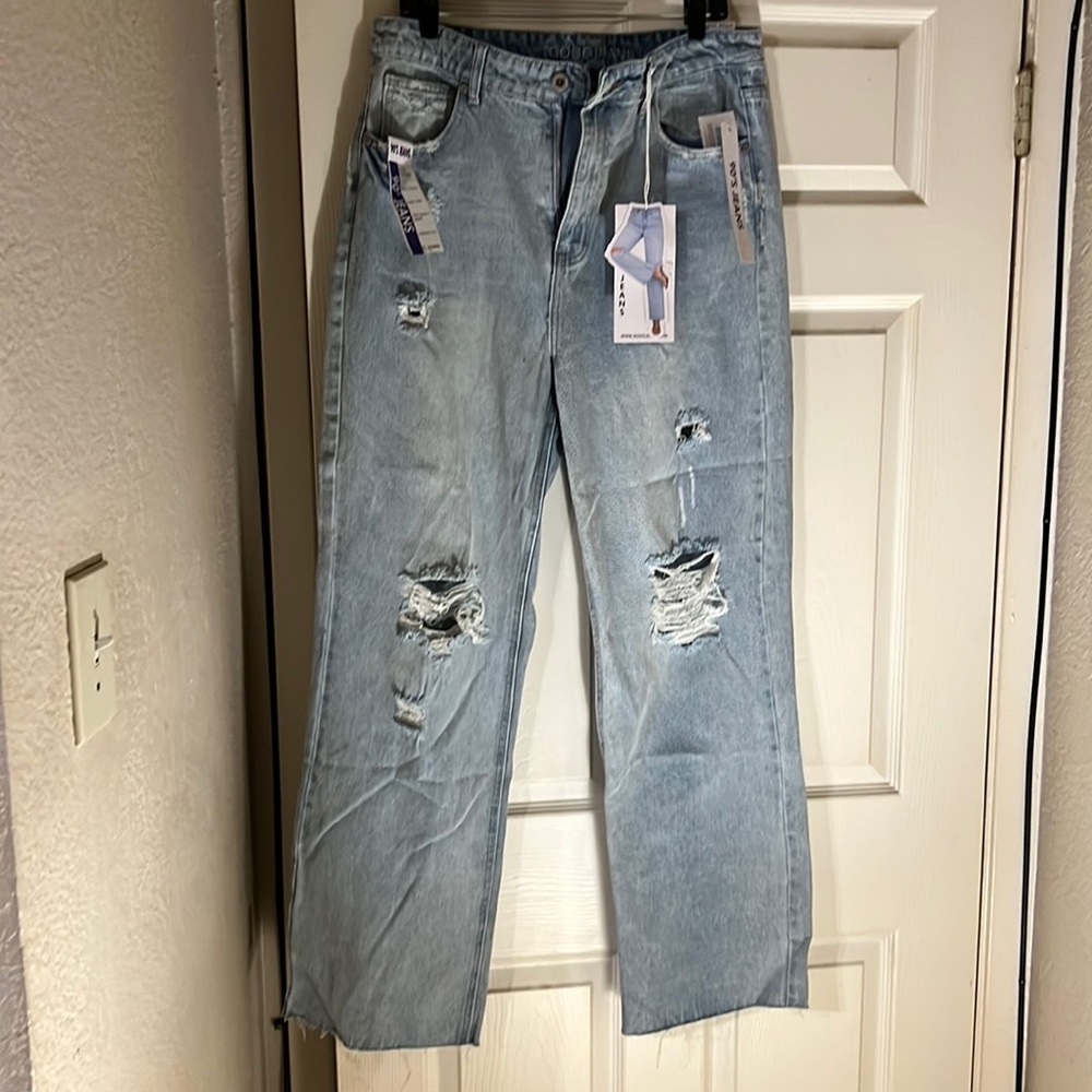 New with tags Super high Waisted light denim 90’s jeans